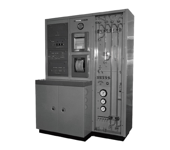 Fig. 4 The KLA-2 amino acid analyzer (1962). The long columns were made of glass and positioned vertically on the front instrument panel to allow their contents to be seen.