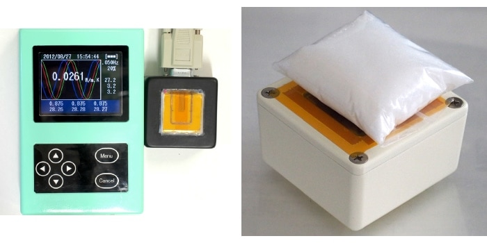 アイフェイズ・モバイル（バルク材・熱伝導率測定型）装置全体と袋入り粉体の測定状況
